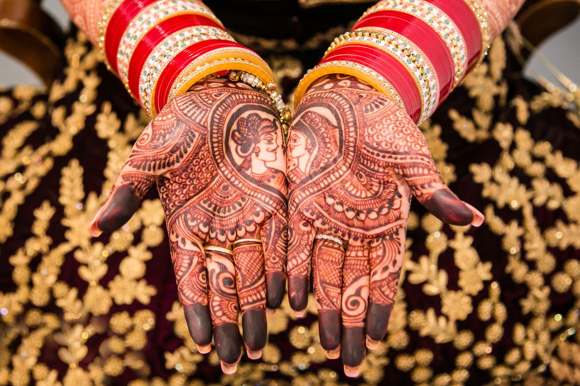Henna on the hands of an Indian bride